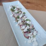 Carpaccio de pulpo con pure de puerro, mayonesa de vinagre