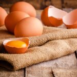 Fresh farm eggs on sacking